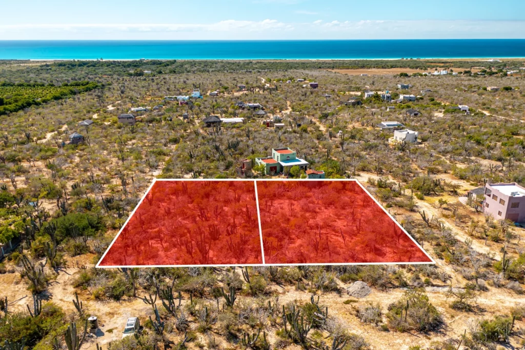 Three quarters of an acre lot filled with soaring Cardon cacti, lush indigenous vegetation and offering mountain and ocean views galore. Located in a small community of like-minded owners who embrace the off-grid lifestyle and the remote location.